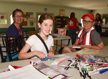 Photo of Cynthia Leonard, her daughter Maya, and Kathleen Maclay.