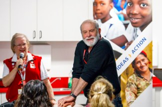 Photo of Red Cross people illustrating hands-only CPR